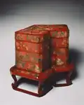 Japanese tiered food Box with stand; late 18th century; red lacquer over a wood core, with litharge painting and engraved gold designs; overall: 53 x 68&nbsp;cm; Cleveland Museum of Art