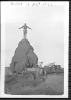 Kurt Johannsen posing on top of an anthill; date unknown