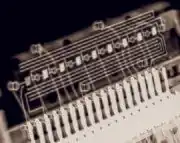 X-Ray of an 8-digit 7-segment multiplexed LED display from a 1970s calculator