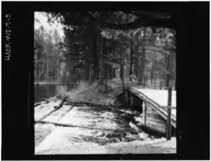 Looking from north embankment above the dam toward south embankment and dam