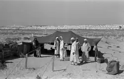 Nomads near a tent